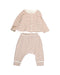 A Ivory Pyjama Sets from Petit Bateau in size 3-6M for girl. (Front View)