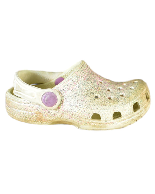 A Ivory Sandals from Crocs in size 3T for girl. (Front View)