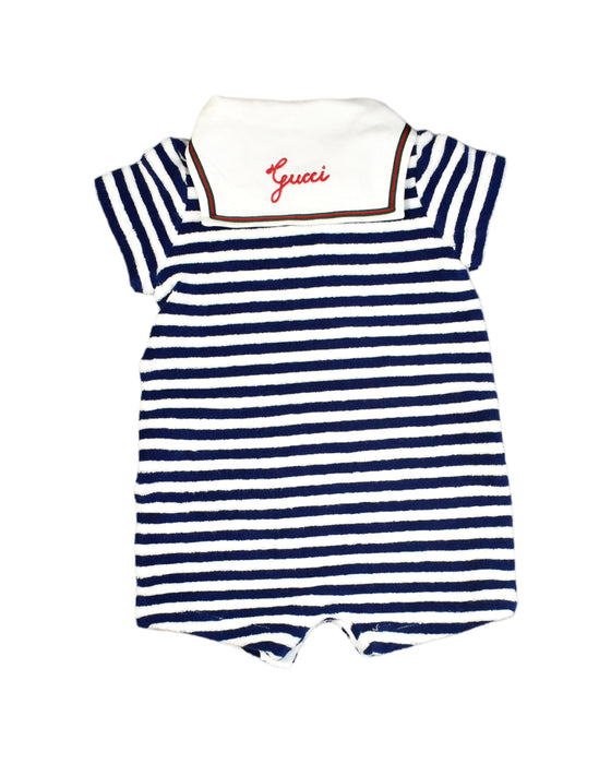 A White Rompers from Gucci in size 6-12M for boy. (Back View)