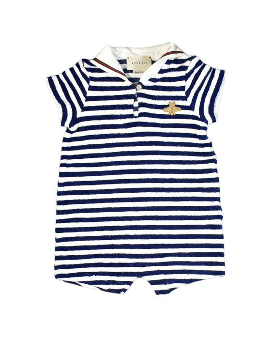 A White Rompers from Gucci in size 6-12M for boy. (Front View)