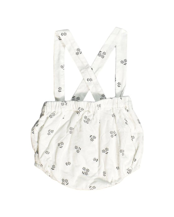 A White Overall Shorts from Jacadi in size 3-6M for girl. (Back View)