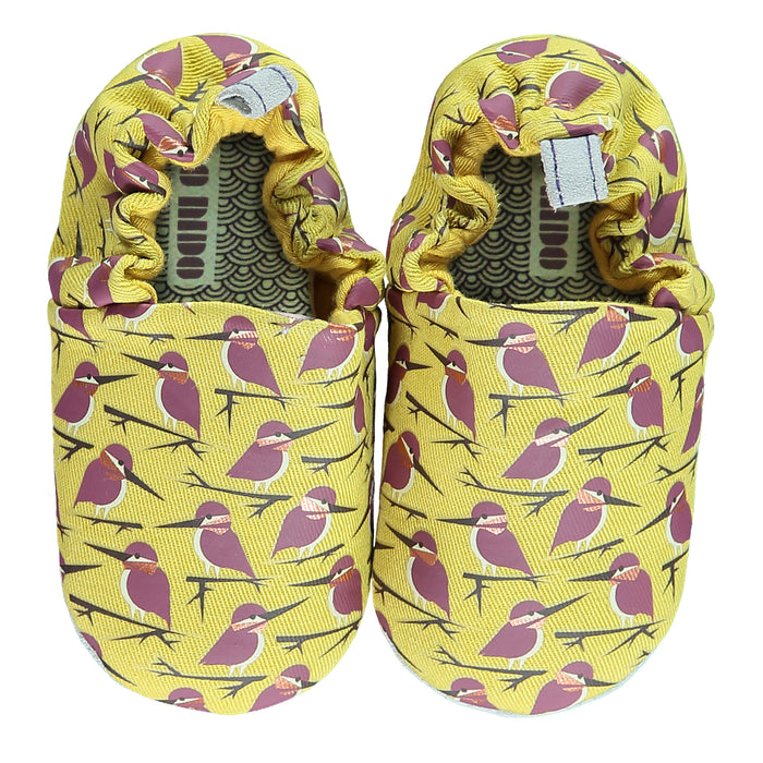 A Yellow Slip Ons from Poco Nido in size 12-18M for neutral. (Back View)