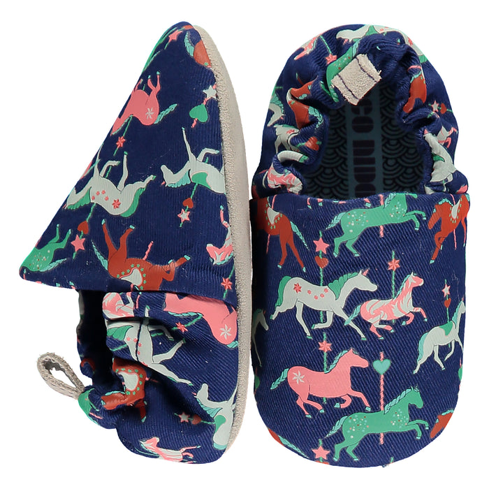 A Navy Slip Ons from Poco Nido in size 12-18M for neutral. (Front View)