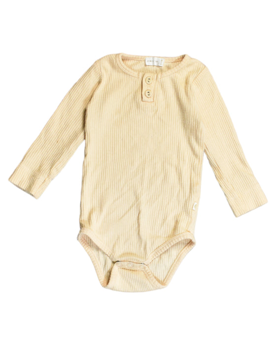 A Yellow Bodysuits from Jamie Kay in size 6-12M for boy. (Front View)