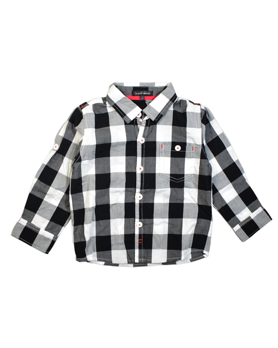 A Black Shirts from Le Petit Society in size 5T for boy. (Front View)