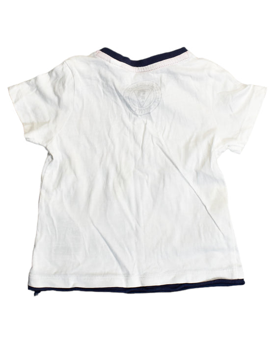 A White T Shirts from Guess in size 6-12M for boy. (Back View)