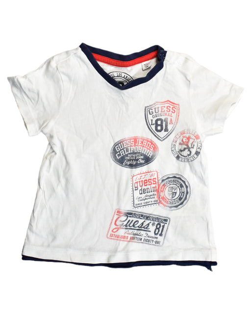 A White T Shirts from Guess in size 6-12M for boy. (Front View)