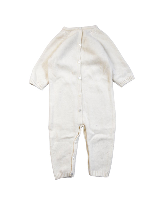 A White Onesies from Ovale in size 6-12M for boy. (Back View)