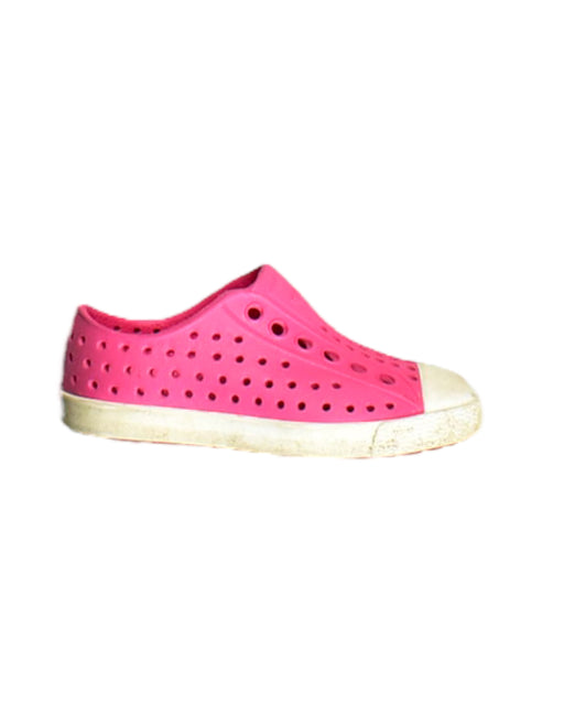 A Pink Aqua Shoes from Native Shoes in size 12-18M for girl. (Front View)