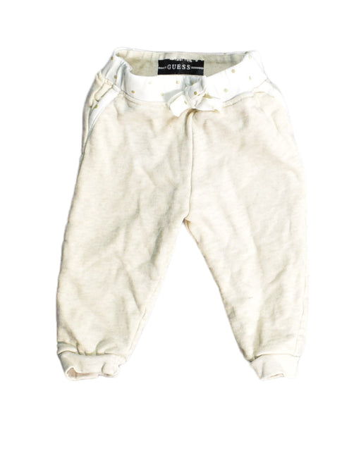 A White Sweatpants from Guess in size 6-12M for boy. (Front View)