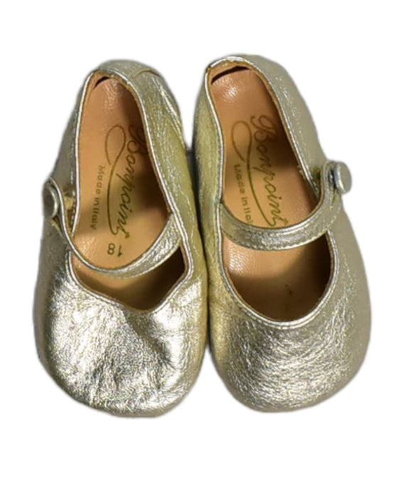 A Gold Flats from Bonpoint in size 6-12M for girl. (Front View)