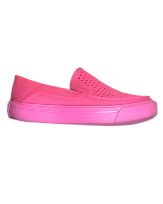 A Pink Slip Ons from Crocs in size 4T for girl. (Front View)