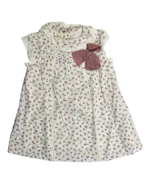 A White Sleeveless Dresses from Nanos in size 12-18M for girl. (Front View)