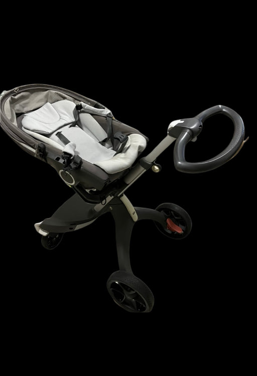 A Grey Strollers & Accessories from Stokke in size Newborn for neutral. (Front View)