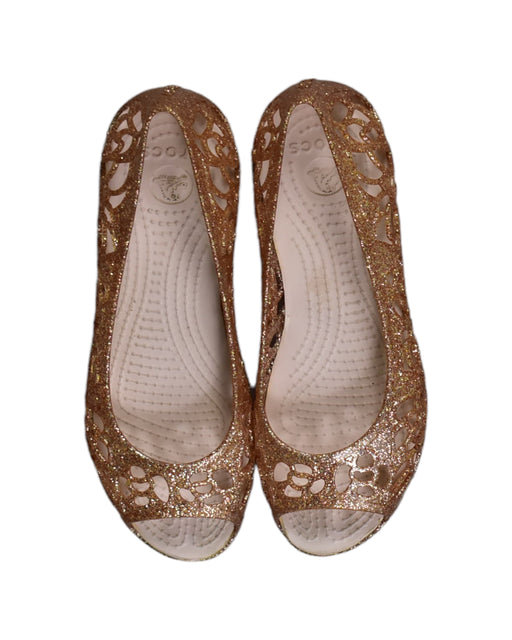 A Brown Flats from Crocs in size 7Y for girl. (Front View)