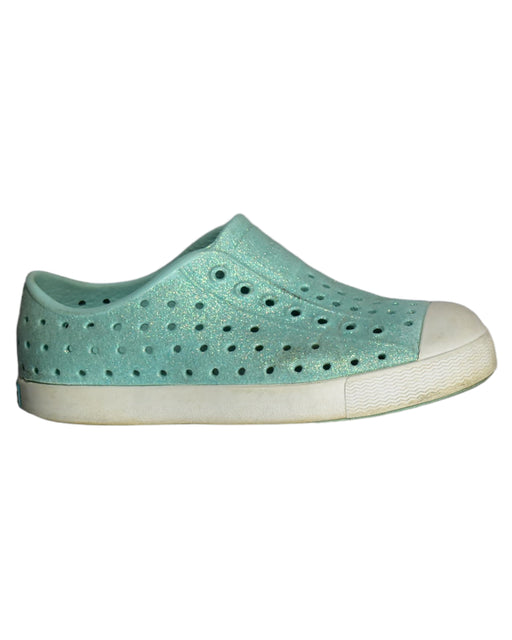 A Green Slip Ons from Native Shoes in size 6T for girl. (Front View)