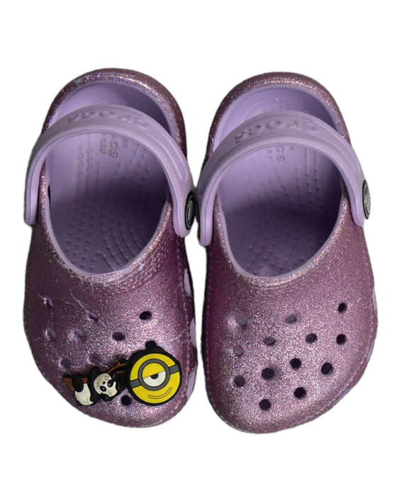 A Purple Sandals from Crocs in size 18-24M for girl. (Back View)